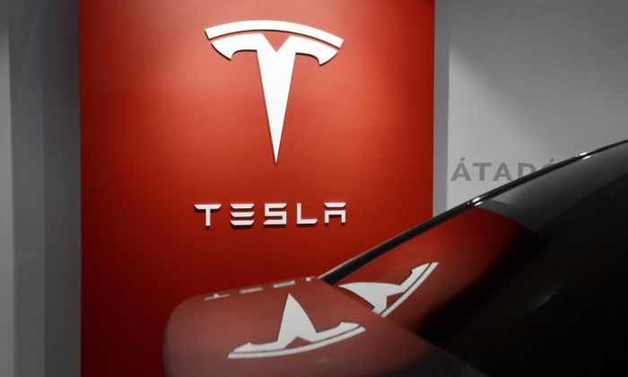 Tesla to open up its charging network to non Tesla vehicles